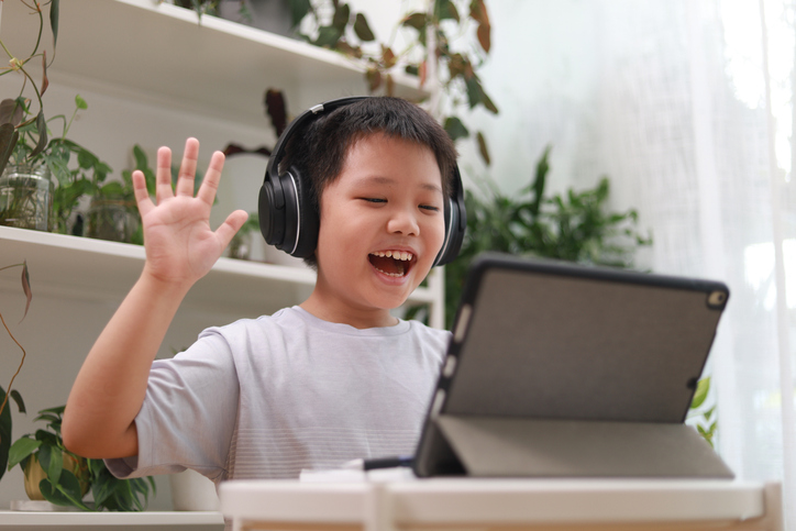 Boy studying at home e-learning